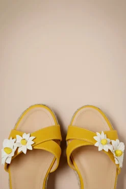 Shop Banned Retro Lady Daisy Wedges In Gelb