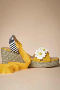 Shop Banned Retro Lady Daisy Wedges In Gelb